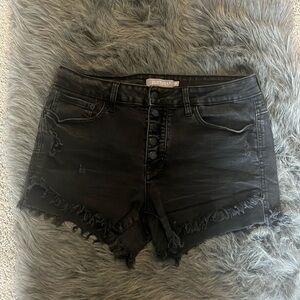 Stretchy black frayed button up shorts